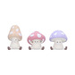 Three wise multicoloured toadstool figurines