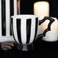 Striped ceramic teacup