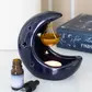 Blue crescent moon hanging oil burner