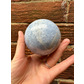 Blue calcite orb 623g 7cm approx