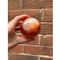 Carnelian orb 489g 6.5cm approx