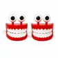 Wind up teeth with eyes