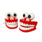 Wind up teeth with eyes